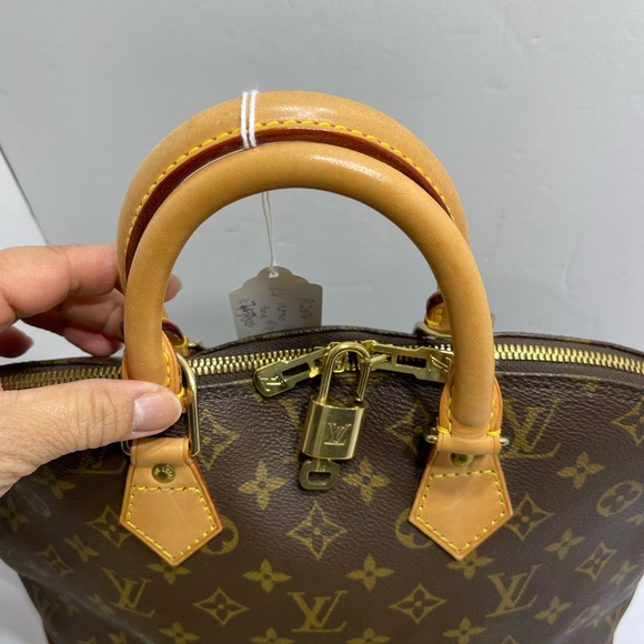 Loui Vuitton Alma in Monogram, with dust bag. - Picture 15 of 16
